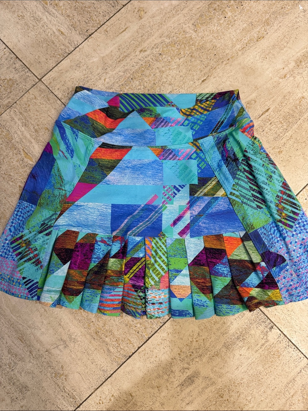 Colorblock Pleated Mini Skirt in Turquoise Multi by Dona Jo